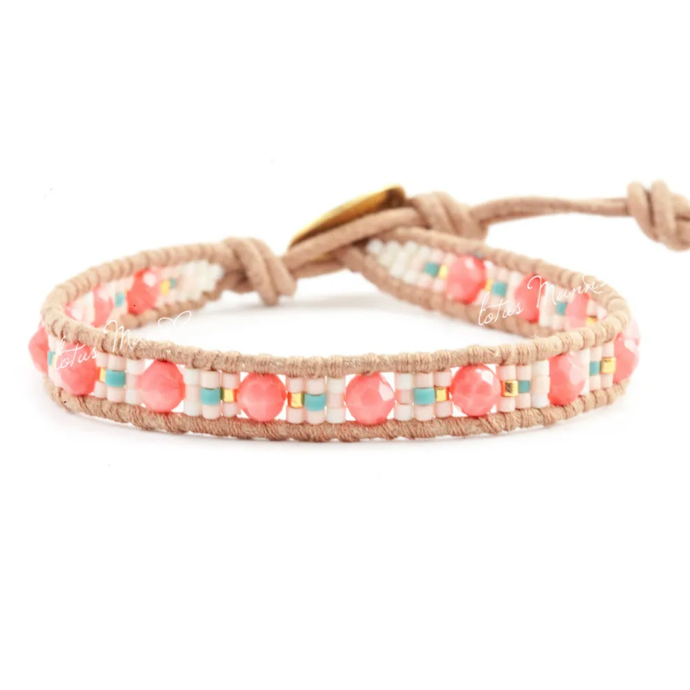 

Lotus Mann In pink and light pink measle spelling a flower color leather rope lap bracelet