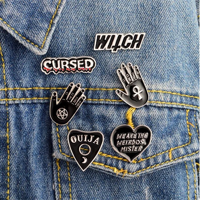 

Fashion Personality Exquisite New Creative Black Magic Witch Palm OUIJA CURSED Heart-Shaped Drop Oil Brooch Shirt Denim Badge