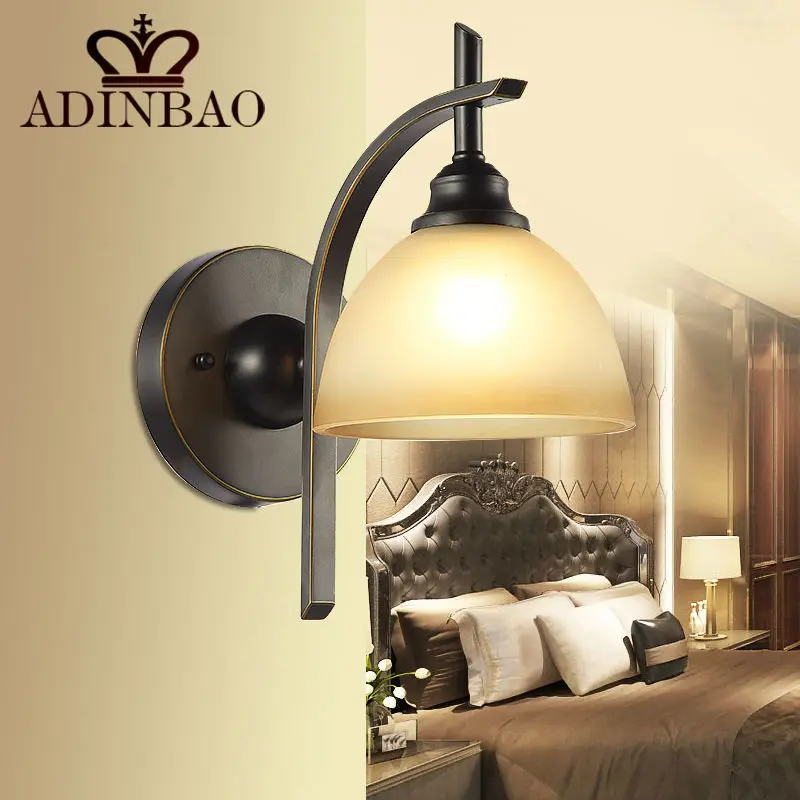 Low Black Wrought Iron Wall Light With Frosted Glass Lamp