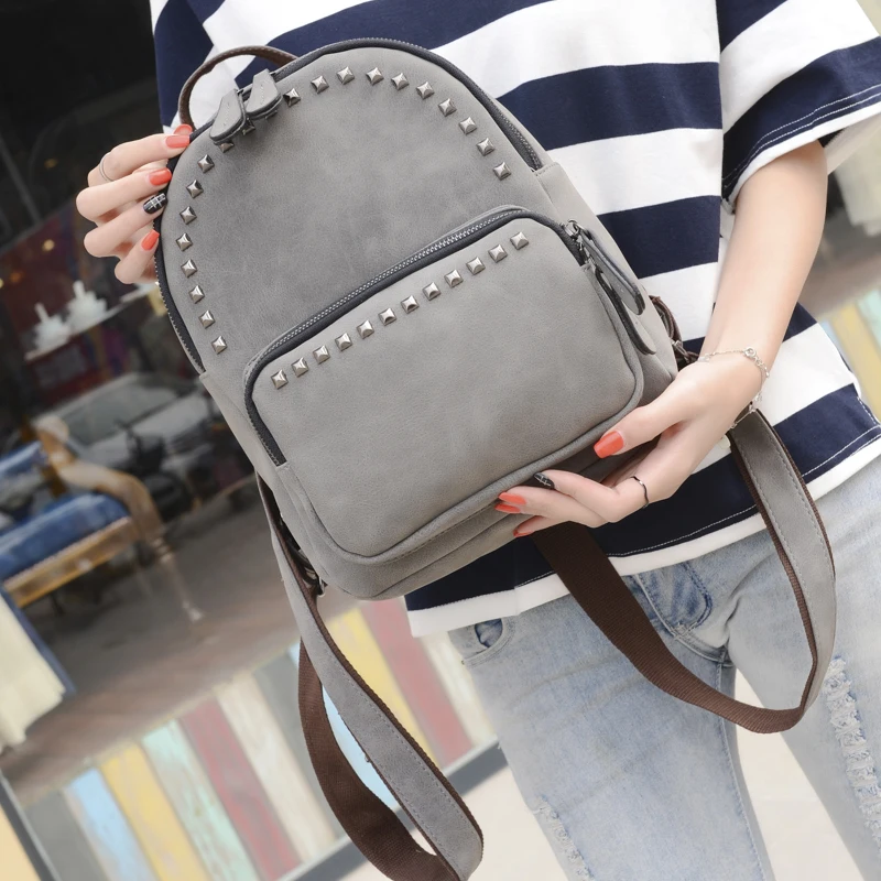 2018 bolso Casual de mujer Vintage con diseño de remaches pequeñas bolsas de viaje de cuero PU para niñas adolescentes escuela Mini Paquete de mochilas preppy 2018 bolso Casual de mujer Vintage con diseño de remaches pequeñas bolsas de viaje de cuero PU para niñas adolescentes escuela Mini Paquete de mochilas preppy