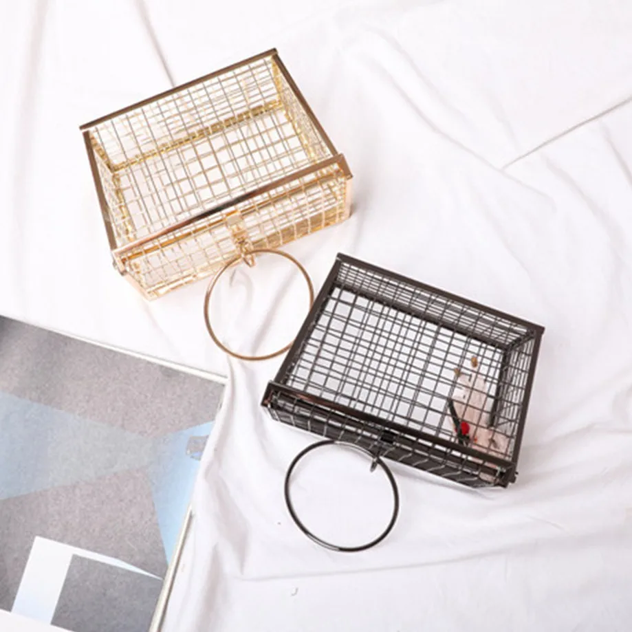 

Metal hollow handbag female iron mesh trapezoidal concave shape handbag