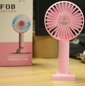 

Free shipping handheld fan Mini desktop phone holder USB charging fan student outdoor portable aromatherapy small fan