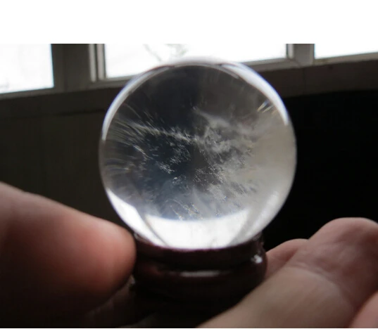 

A 42240mm natural transparent rainbow quartz crystal sphere ball heal (0601)