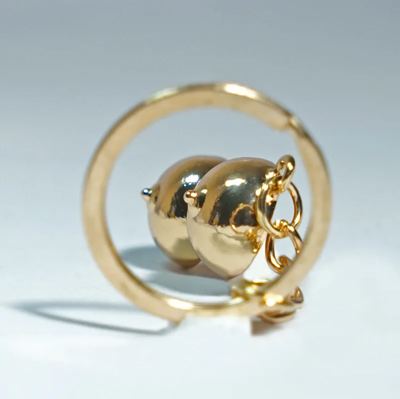 

Fashion Sexy Female Breast Key Chain Life Source Great Strength Golden Key Ring Car Pendant