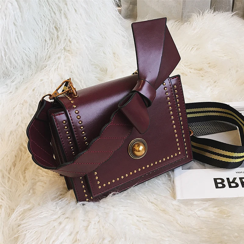 

Bow Hand strap small Rivet totes Round lock handbags women messenger bag designer PU leather fashion luxury solid shoulder bags