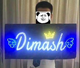 

Dimash Kudaibergen autographed signed bezel DEAR and glowing inscription banner
