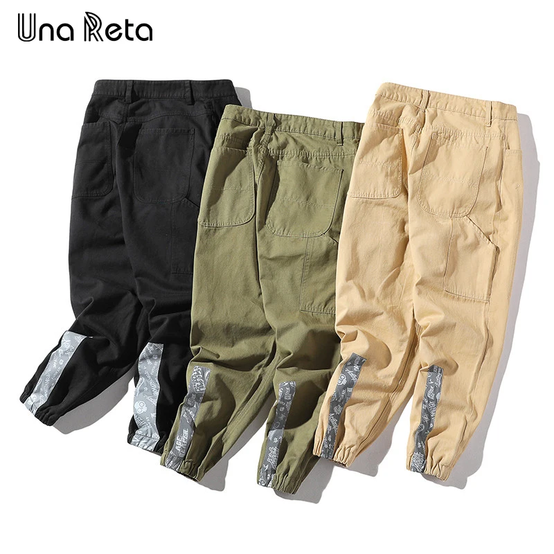 

Una Reta Mens Pants 2018 New Fashion casual Trousers Pattern stitching design Ripped Streetwear pants Men Brand Hip Hop Pants