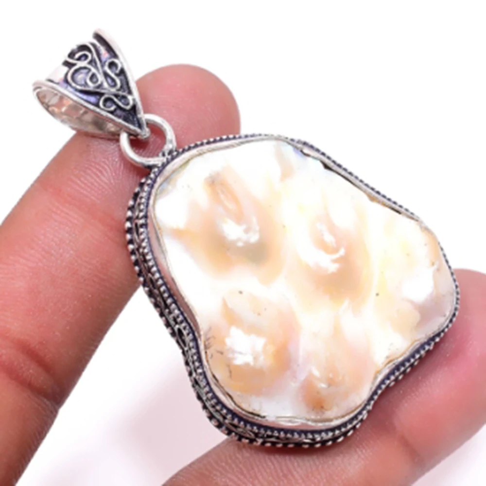 

Biwa Pearls Pendant Silver Overlay over Copper , 56 mm, P5640
