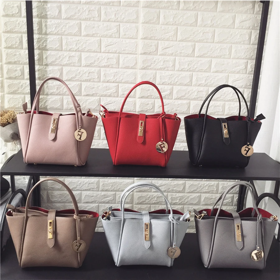 

Luxury Brand Solid Color Lychee PU Leather Women Rivet Handbag Designer Large Capacity Shoulder Bag Quality Leisure Travel Bag