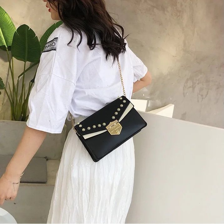 Retro rivet bag design sense lady bag clamshell PU leather lady crossbody bag chain bag new bag
