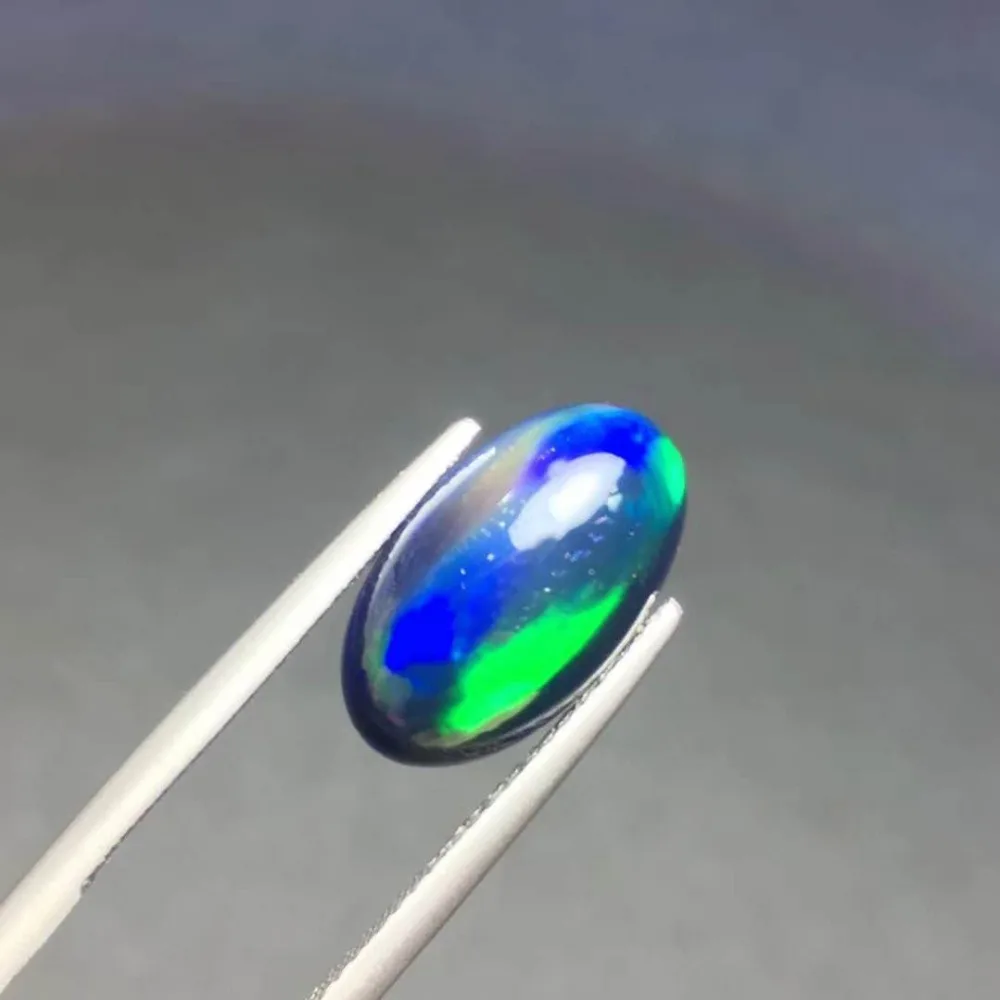 

Fine quality 3.45 ct Blue Opal , Perfect scintillation ring surface .Specifications: 14.3mm*8.3mm*5.8mm.