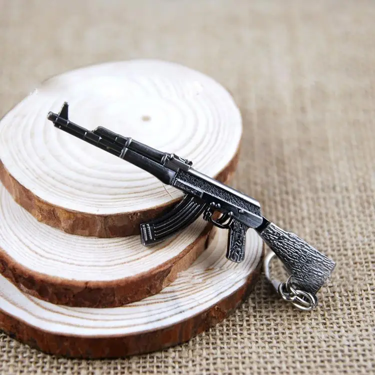 

Novelty Items Counter Strike AK47 Guns Model Toys Keychain Trinket AWM Rifle Sniper Keyring Souvenirs Gift for boys men
