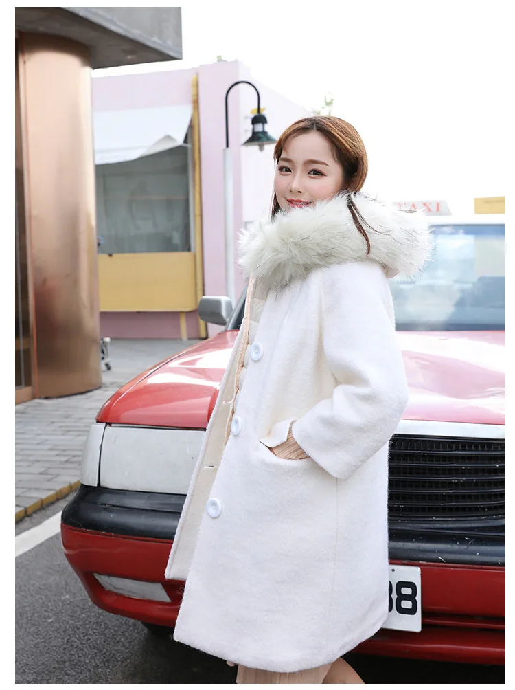 Cold and warm Winter's winter down jacket new Korean version of the long section was thin waist Raccoon Fur big stand vest