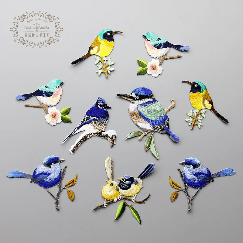 

The new high-end embroidery bird Tracy exquisite cloth dress patch hole applique DIY symmetric section supplement