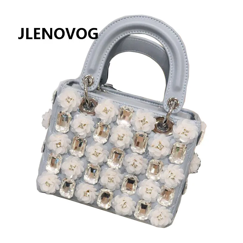 

One-shoulder diagonal portable soft handle outdoor travel spring new diamond flower lattice shoulder carrying bag