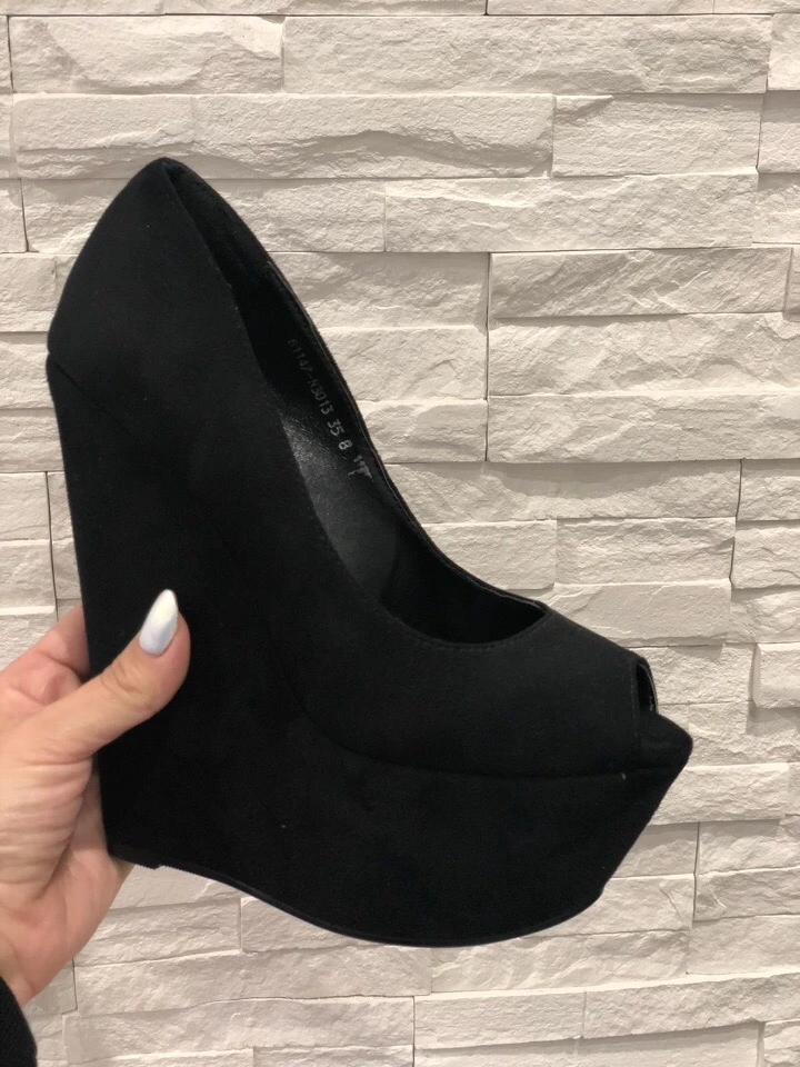 black suede wedge pumps