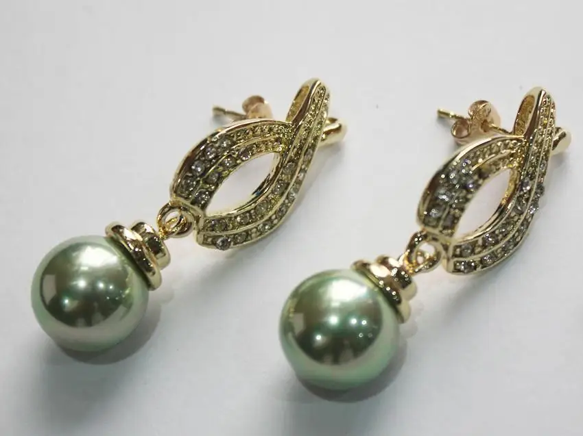 

FREE SHIPPING>>> latest fashion lady's nicest 18KGP with crystal plated leave shape +12mm gray pearl bread earring