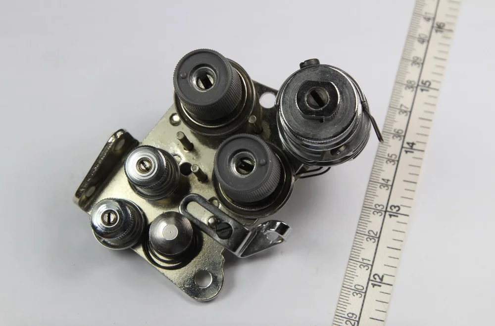 

SEWING MACHINE SPARE PARTS THREAD TENSION ASSM.