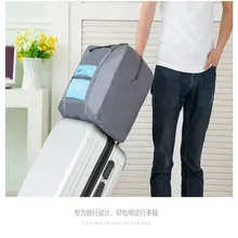 

Spot sales of Korea folding travel bag portable travel bag nylon waterproof large capacity clothing bag.