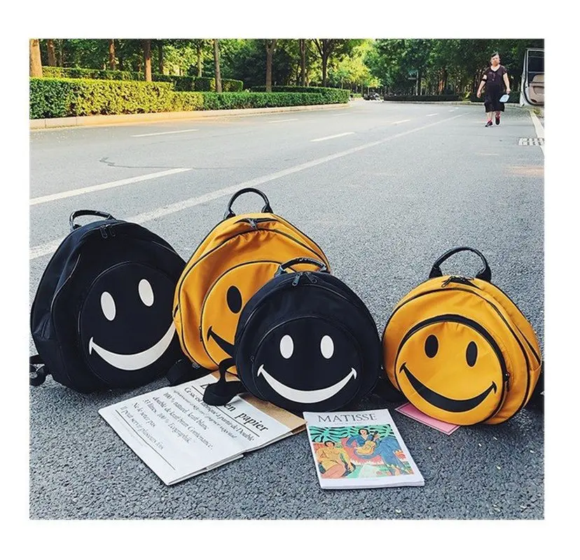Новые женские Симпатичные улыбающееся лицо рюкзак корейский стиль личности женщины сумка Желтый Черный Забавный мультфильм сумки