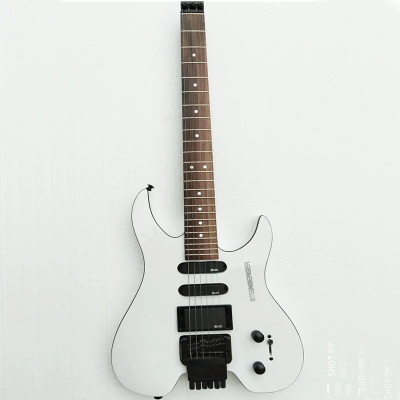 Eagle. Butterfly, electric guitar, electric bass, custom instrument shop .Headless Electric Guitar Steinberg White Guitar.