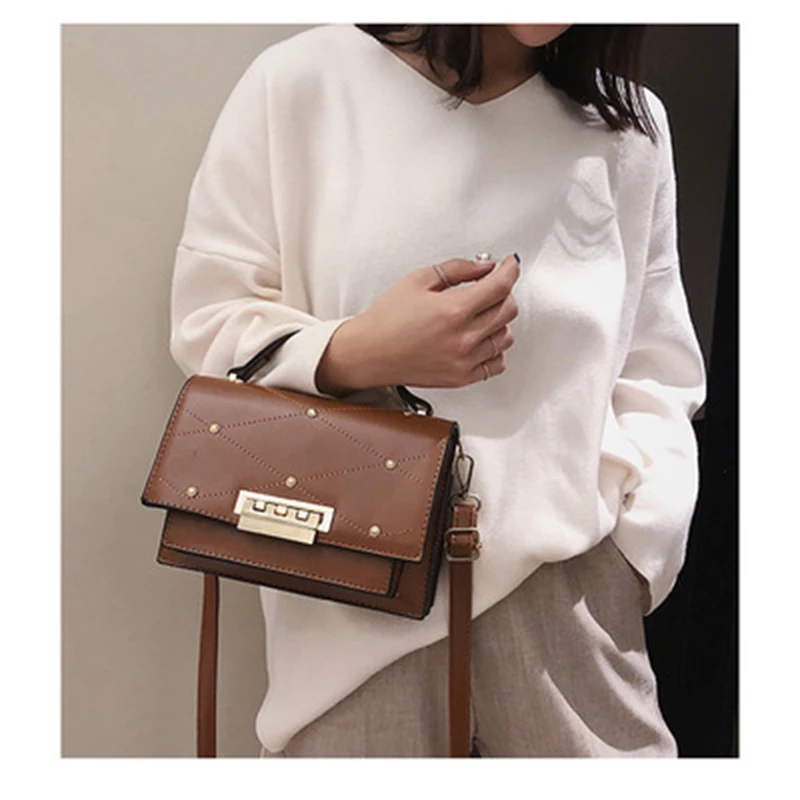 

2019 four seasons new trend fashion Korean version of the slung shoulder bag multi-function simple stone small square bag