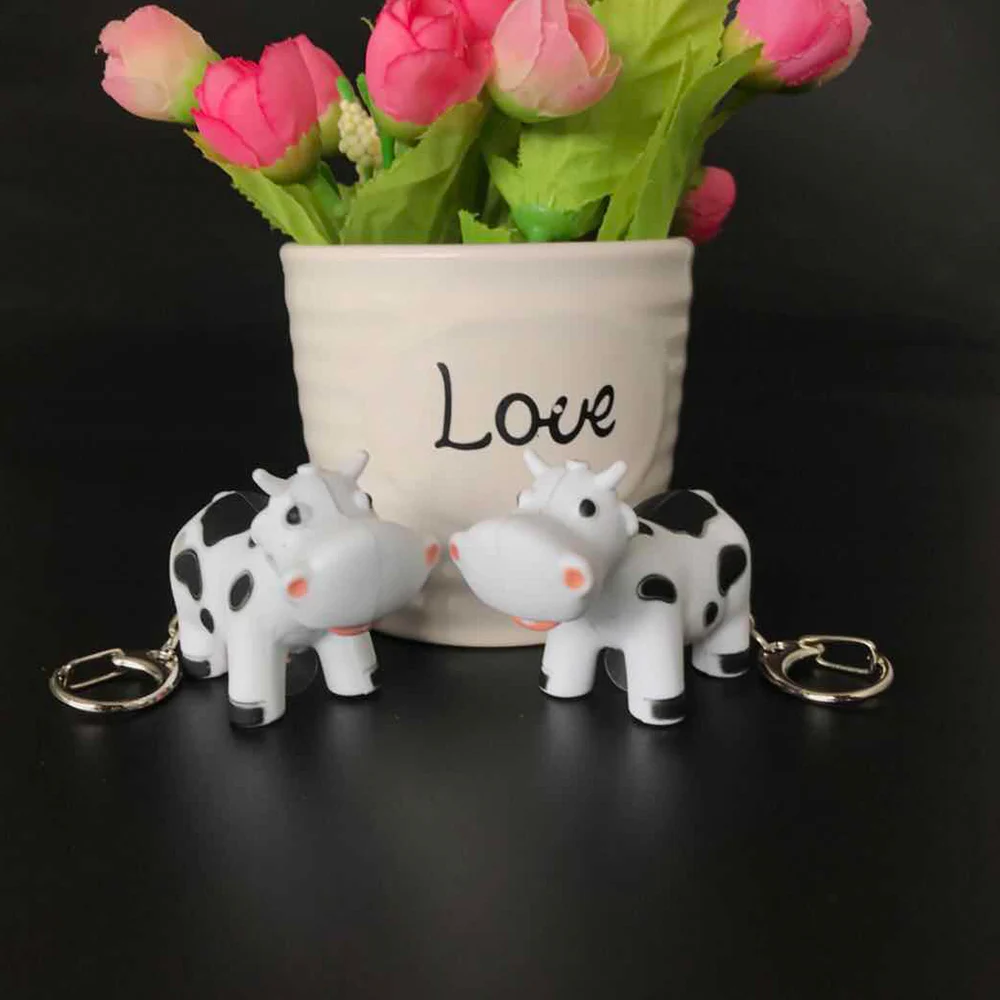

New Plastic Mini Key Rings Cartoon Small Cow Design LED Lights Glow Vocal Key Chain For Children's Gifts Hot Sale