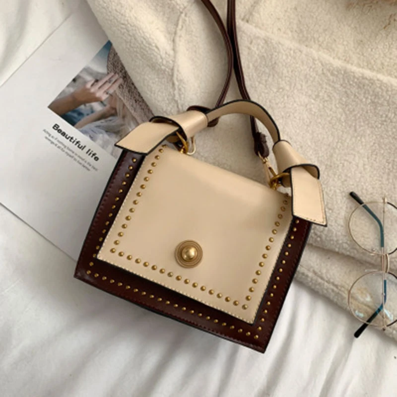 

2019 new Korean version of the portable multi-function bucket bag simple elegant one-shoulder fashion wild Messenger bag female