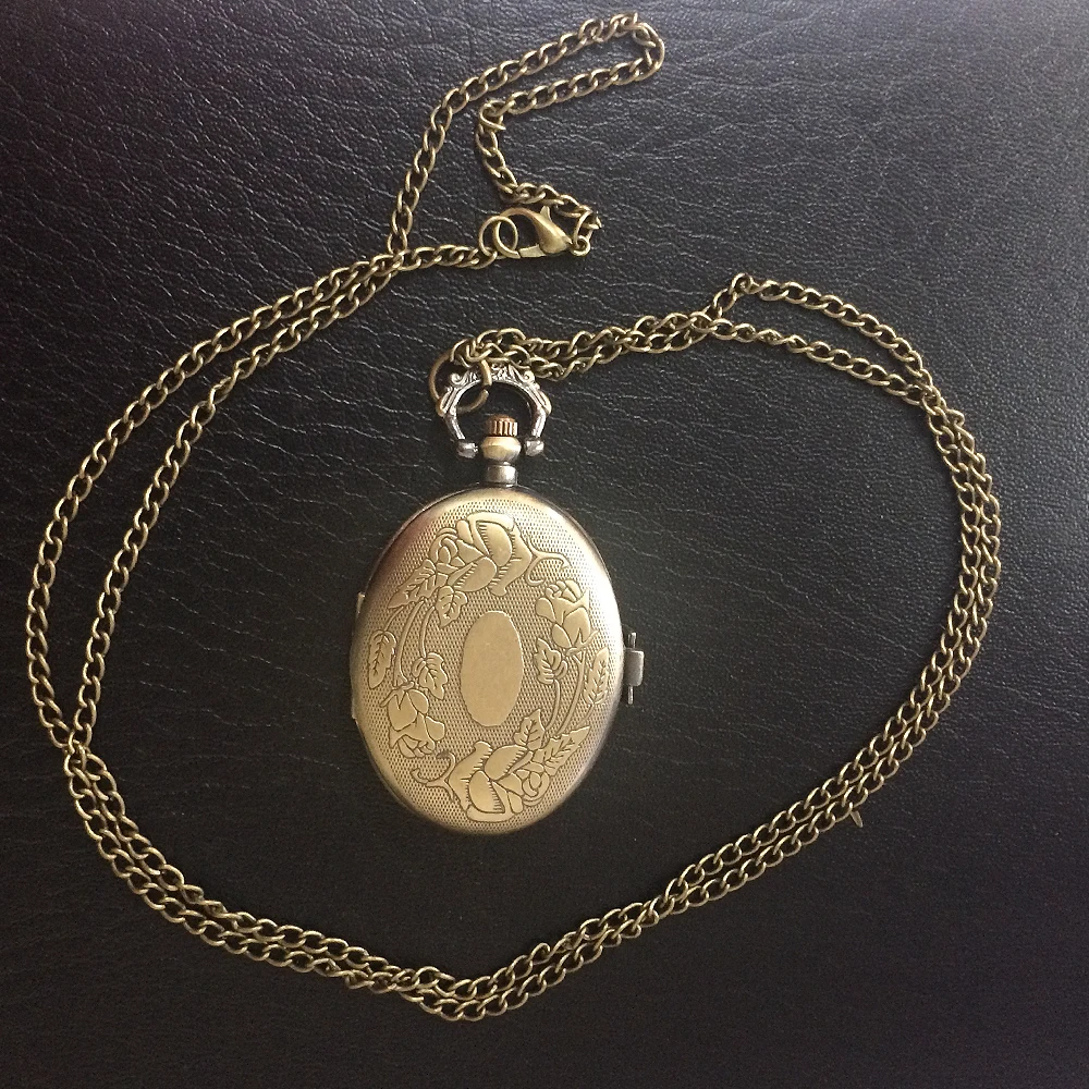 Под бронзу женские Для женщин Овальный кварцевые карманное Ожерелье Часы римскими цифрами подарок красивый Рождественский подарок цена H121
