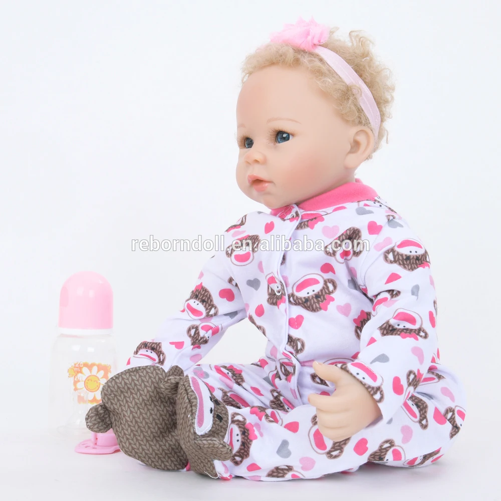 muñeco bebe ojos grandes