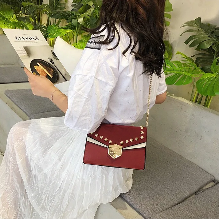 Retro rivet bag design sense lady bag clamshell PU leather lady crossbody bag chain bag new bag