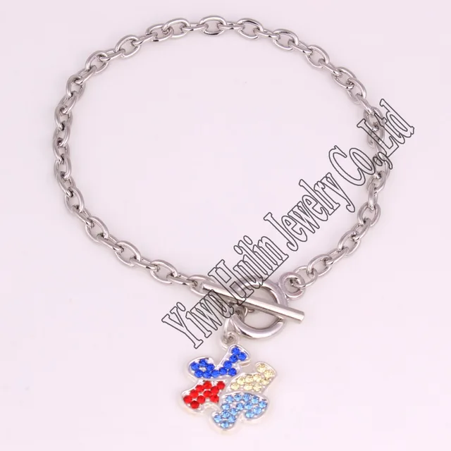 Rhodium Plated Autism Awareness Puzzle Piece Charm Bracelet In Chain Rhodium Plated Autism Awareness Puzzle Piece Charm Bracelet