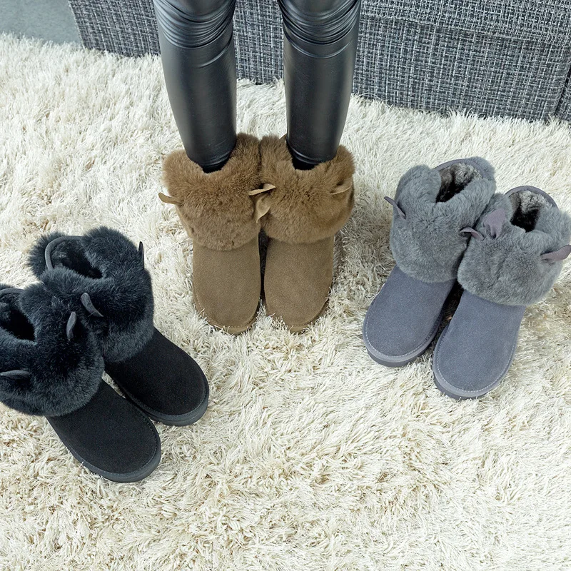 

2018 fur one rabbit ears snow boots female winter short tube thick warm flat cotton shoes.
