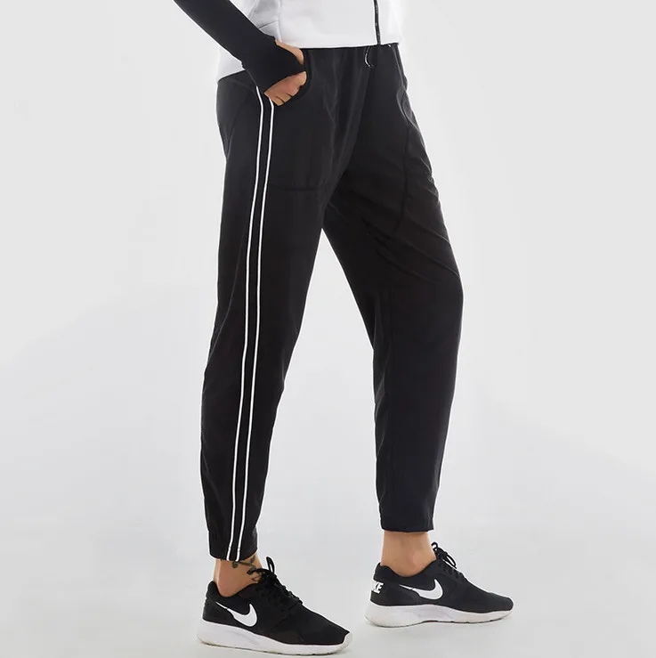 

New 2017 Women's Sports Trousers Running Gym Fitness Pants Female Loose Dry Quick Workout Leggings Capris Lace-up Pants