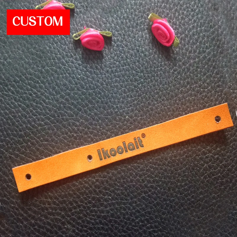 factory private customzied PU embossed labels sewing on clothing