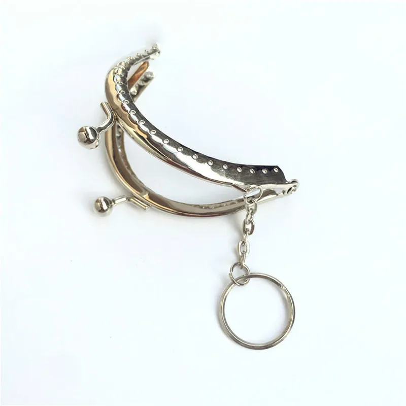 

Silver Tone 1Pc Metal Frame Pattern Lock Fashion Purse Metalwork With Key Ring Arc Shape Delicate Hole DIY Kiss Clasp Lock 8.5CM