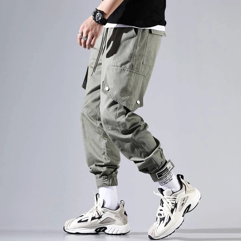 Fashion Streetwear Men Jeans Loose Fit Big Pocket Cargo Pants Men Harem Trousers Slack Bottom Designer Hip Hop Joggers Pants