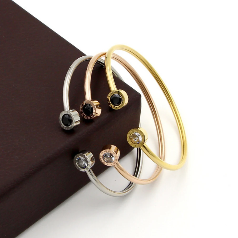 

Stainless Steel Black and White Zircon Hollow Twisted Wire Bangle Bracelet With Roma Numerals