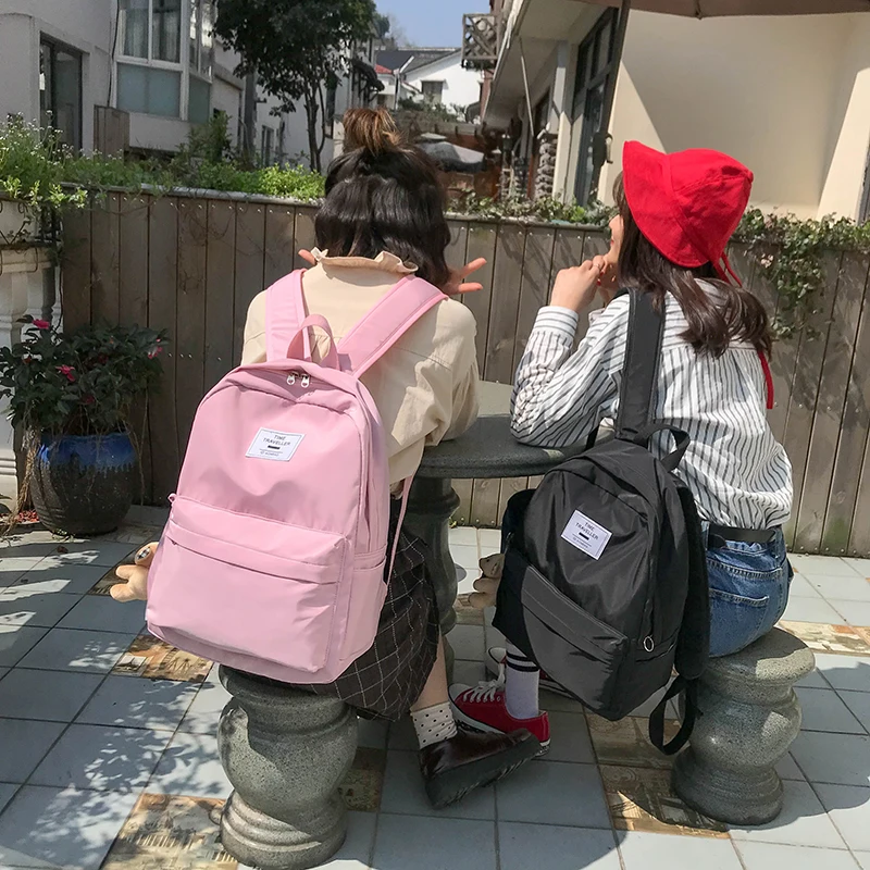 

DCIMOR Fshion Nylon Backpack Solid Color Casual Shoulder Bag Women Backpack School Bags For Teenagers Girls Mochila Rucksacks