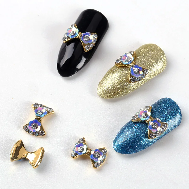 

Blueness 10Pcs/Pack Rhinestones For 3D Nail Art Decoration Metal Silver Bow Mix Blue Flower Charms Mail Accessories TN2196