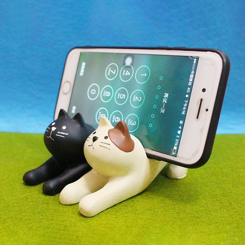 

Japan cute kawaii cartoon Maneki Neko calico black cat stretch watching TV hot spring bath phone holder figures desktop
