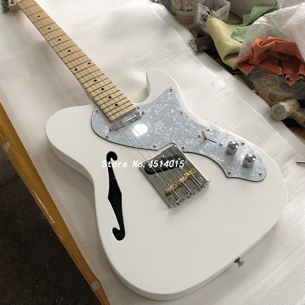 

Grote high quality white electric guitar with f empty copper bridge, maple neck, real photo