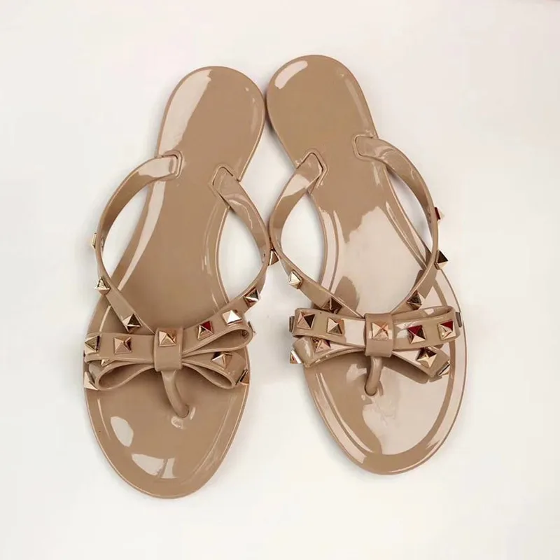 JAWAKYE-Women-Rivets-Bowknot-Flat-Slippers-sandals-Girls-Flip-Flops-studded-Summer-Shoes-Cool-Beach-Slides (1)