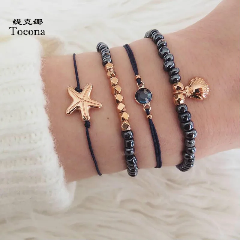 

Tocona New Arrival Women Summer Gold Color Starfish Shell Shape Design 4pcs/sets Bracelets For Ladies Summer Present 3824