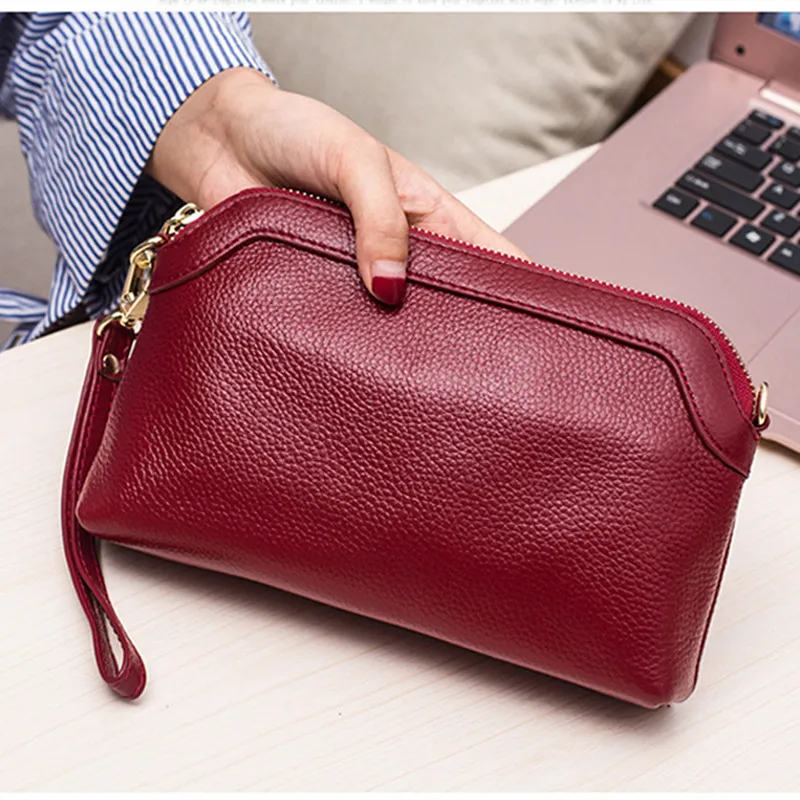 red designer clutch bag