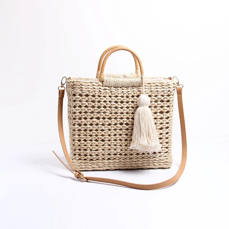 

New straw bag hollowed out hand-woven bag female handhelds cross-ins da Rong seaside beach resort bag