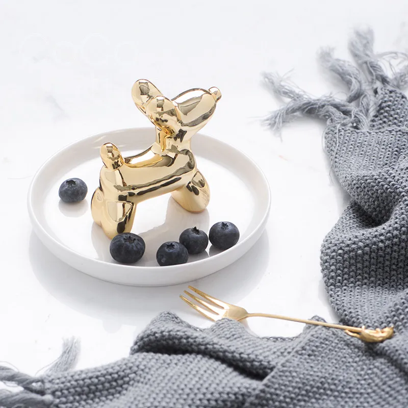 16  Ceramic jewelry dish             (5)