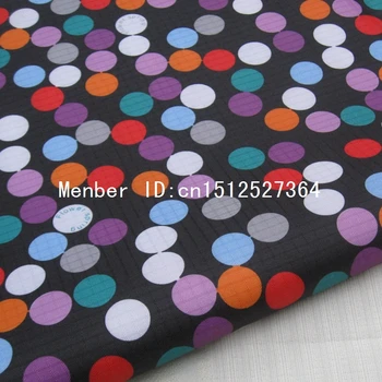 

WF192 - PVC coated waterproof fabric - Color Dots on Black