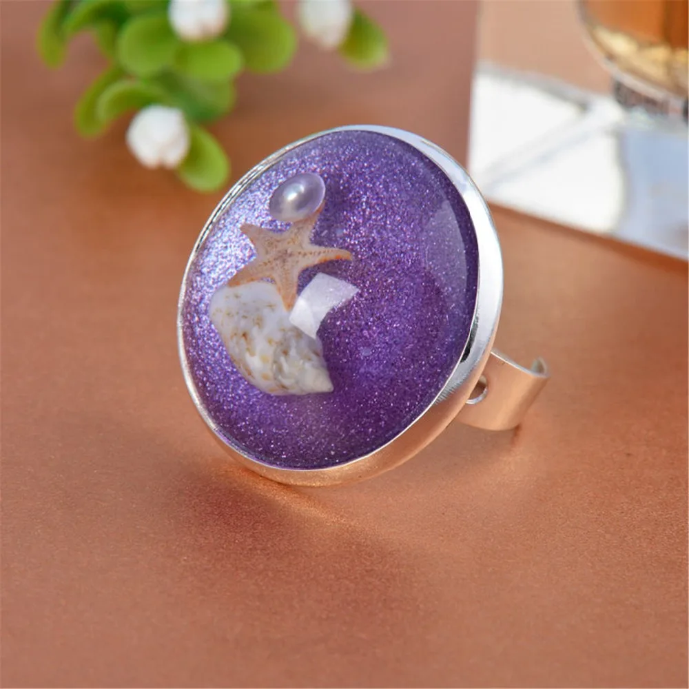 VENDA-QUENTE-2-pcs-30mm-De-enchimento-de-Resina-Estrelas-Do-Mar-natural-Shell-P-rola (1)