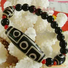 Новое поступление Тибетский браслет с Бусиной Дзи девять глаз старый дзи абсолютно новое состояние с красными камнями прокладки